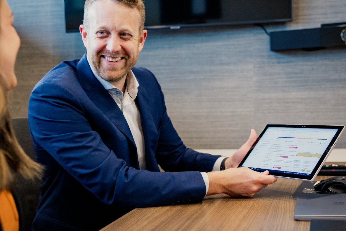 A Resolve attorney walking a physician through a contract review on screen